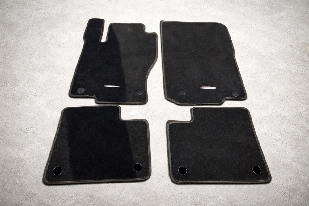 d408729c-0977-4075-ae77-479c86accad0 Mercedes-Benz ML 350 AMG 12-15 Juego Tapetes OEM Originales